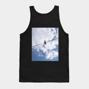 Girl in slingshot against blue cloudy sky Tank Top